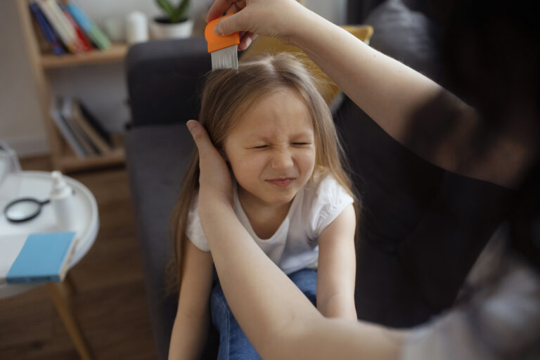 mother-taking-care-child-with-head-lices